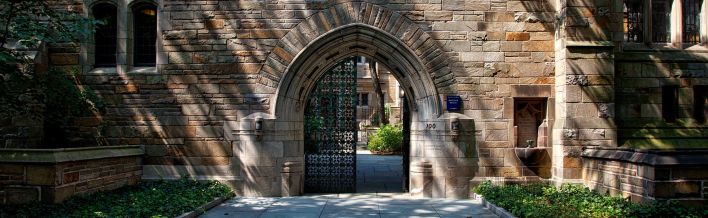 Steel Gate of Brown Brick Building