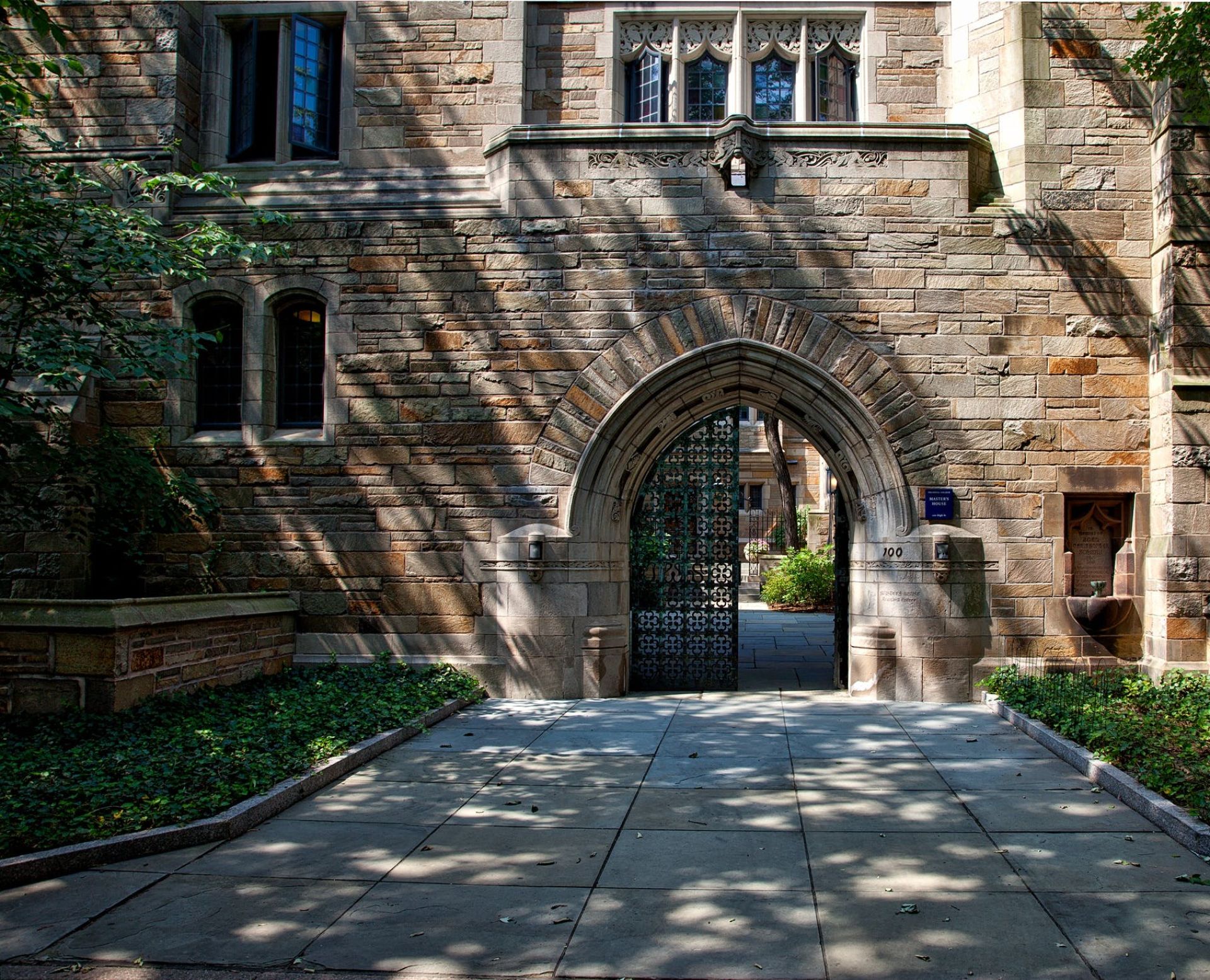 Steel Gate of Brown Brick Building