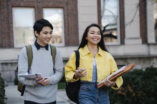 Young Man and Woman Walking Together